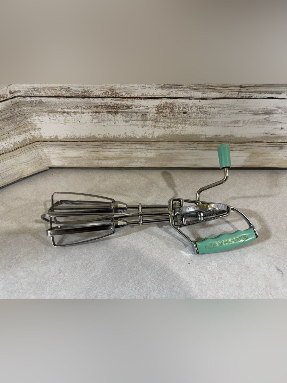 Vintage egg beater with turquoise handles (decor)